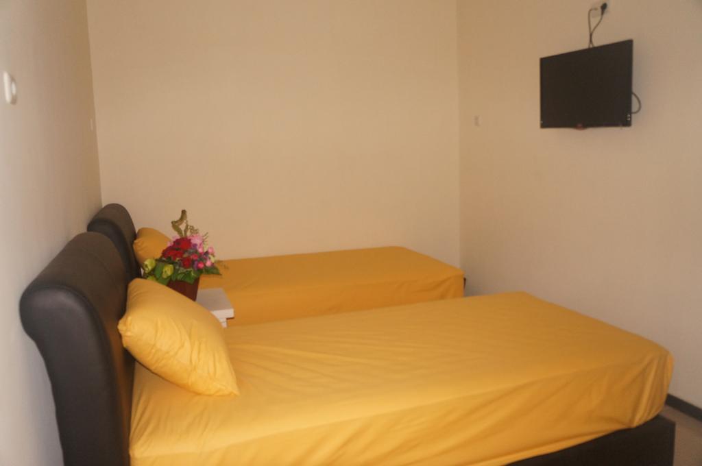 Budget Guest House Tunas Mandiri Jaya مالانغ الغرفة الصورة